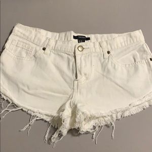 White distressed shorts